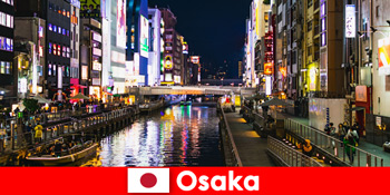 Underholdningsdistrikter og delikatesser venter udenlandske rejsende i Osaka Japan